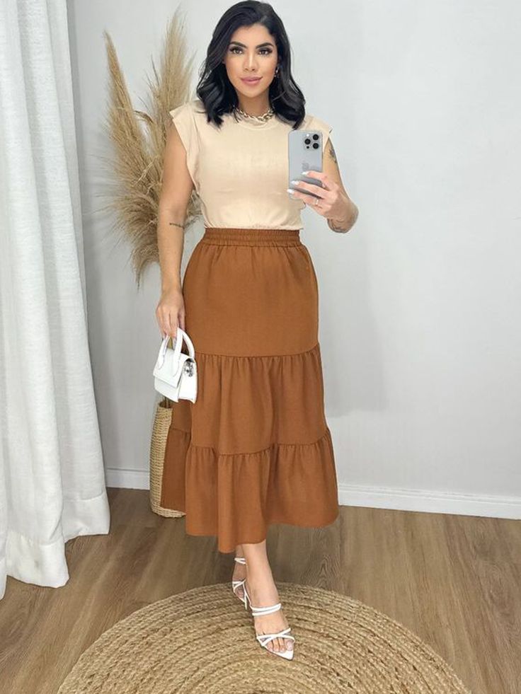 Saia Midi próximo ao tornozelo (Pinterest)